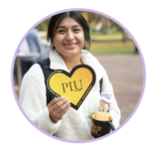 Student with PLU Heart and Cupcake